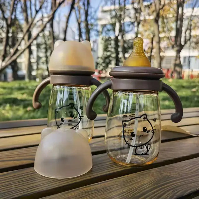 Biberón portátil de doble asa y boca ancha