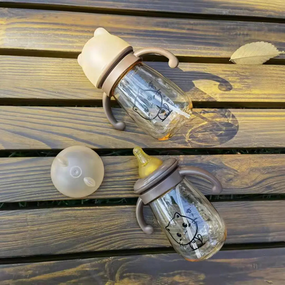 Biberón portátil de doble asa y boca ancha