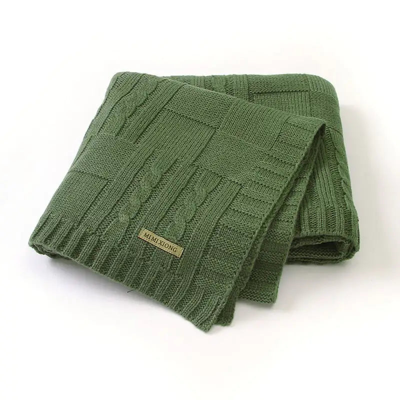 Manta de bebé tejida de color liso